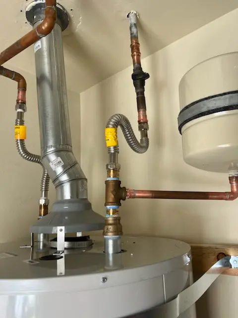 Water heater installation and plumbing repair in Woodcroft